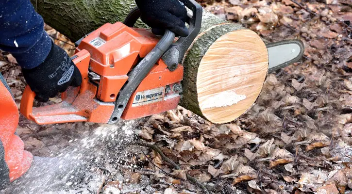 Chainsaw slicing wood