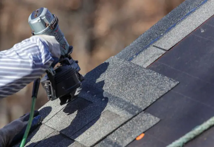 fastening shingles to a roof